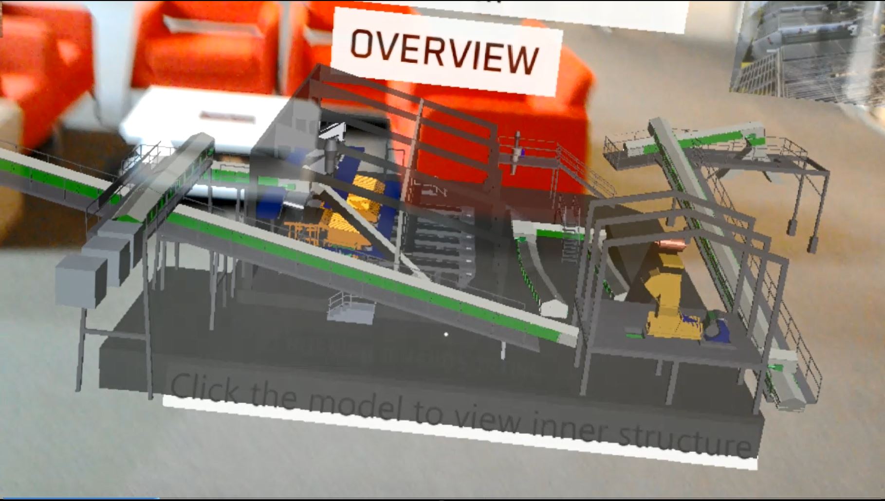 A CAD model that could fit on a desk, as seen through
            HoloLens